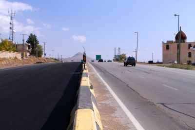 Hot thin Layer Polymer modified asphalt in Firouzkooh – Damavand road